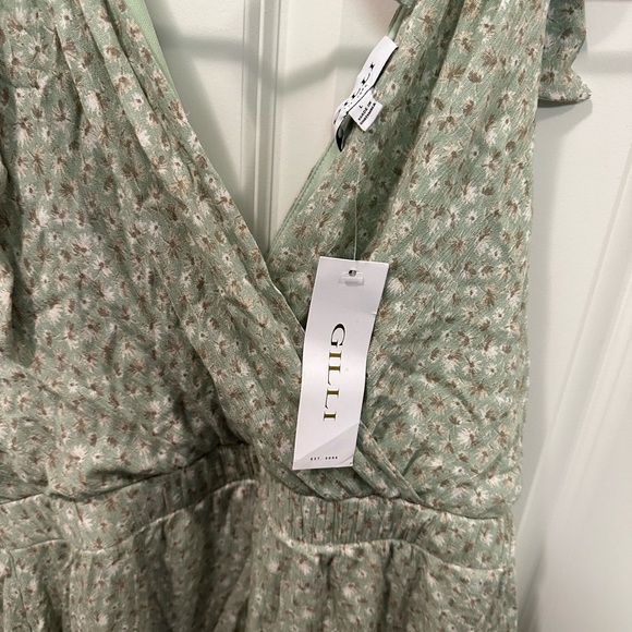 Cute mini dress. Purchased through dailylook, but never wore it. - Picture 3 of 4